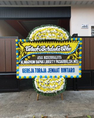 Papan Bunga Duka di Metro Utara
