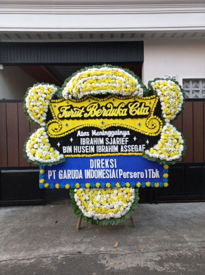 Papan Bunga Duka di Metro Utara