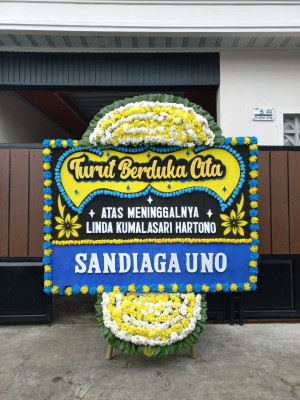 Papan Bunga Duka di Metro Utara